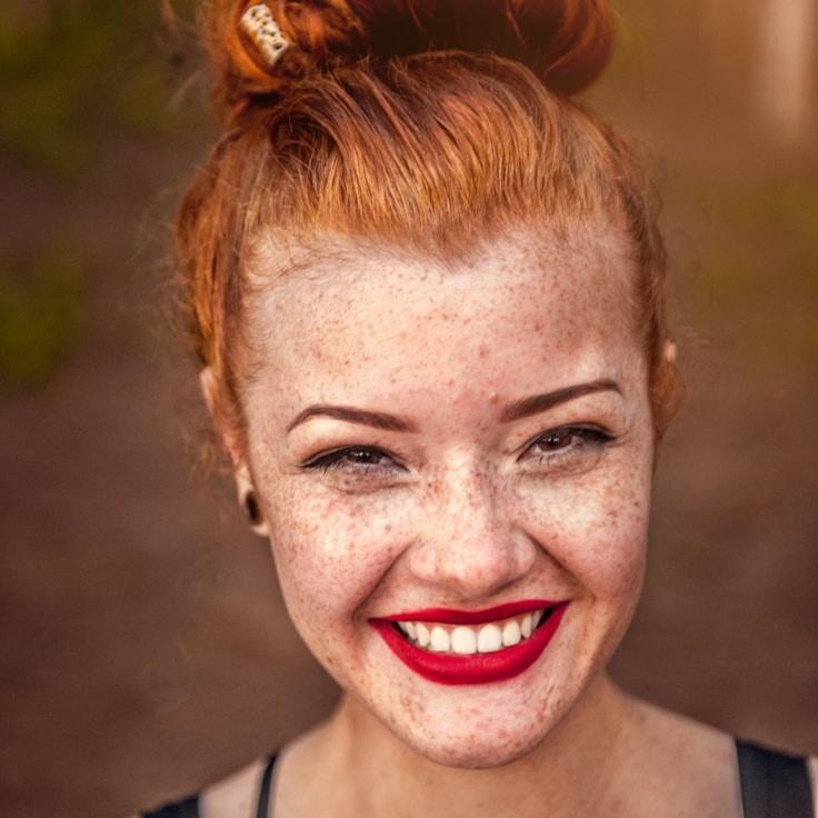 Aisha Rahman, Lead Design Curator at VerdexiaLotera, reviewing corporate floral arrangements